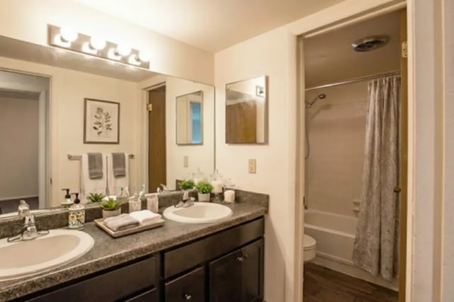 Double vanity sinks shower tub and toilet bathroom at Americana Apartments in East Lansing Student Accommodation