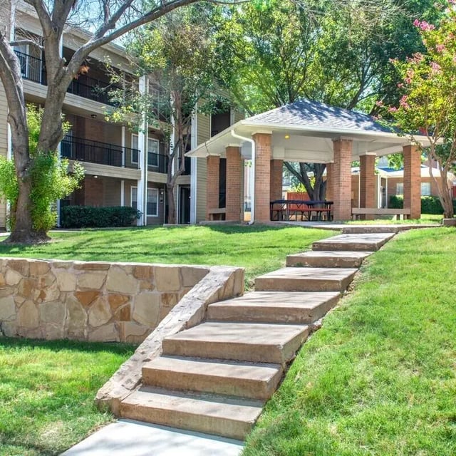 Apartment building with picnic shelter and stairs exterior at Centennial in Arlington Student Accommodation