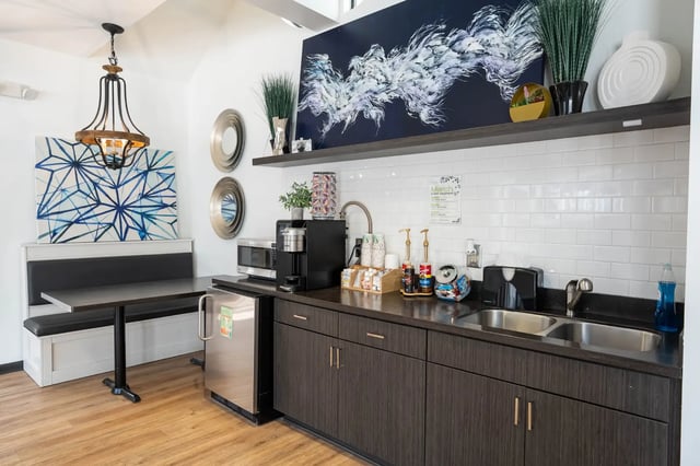 Microwave coffee maker fridge and sink communal kitchen at The Redland Apartments in Athens Student Accommodation