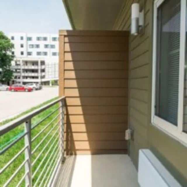 Balcony railing grassy area building exterior balcony at WestEdge in Springfield Student Accommodation