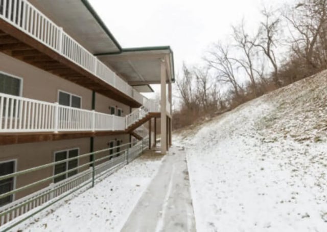 Apartment building with balconies and snow exterior at Metro Towers in Morgantown Student Accommodation
