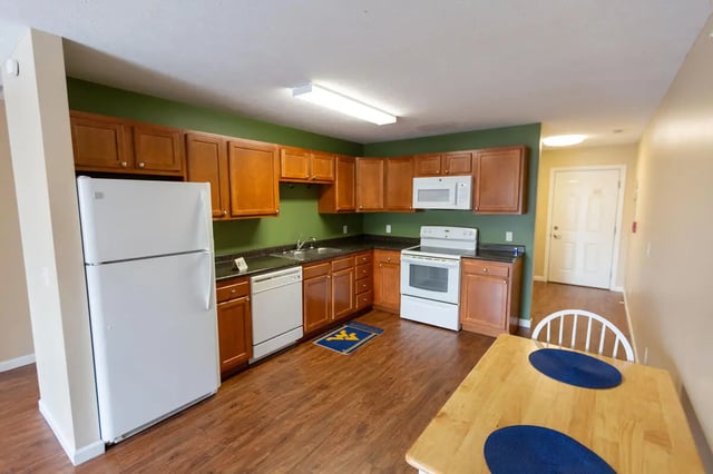 Kitchen with white refrigerator and oven kitchen counter kitchen at Metro Towers in Morgantown Student Accommodation