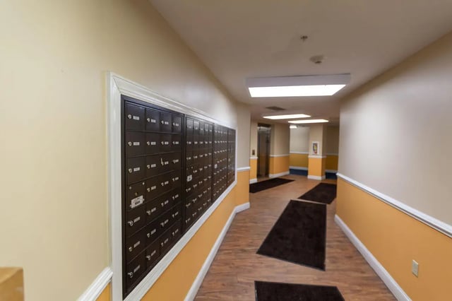 Mailboxes and hallway with elevator exterior at Central Place in Morgantown Student Accommodation