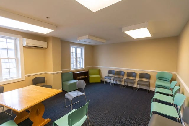 Table chairs and air conditioner common area at Central Place in Morgantown Student Accommodation