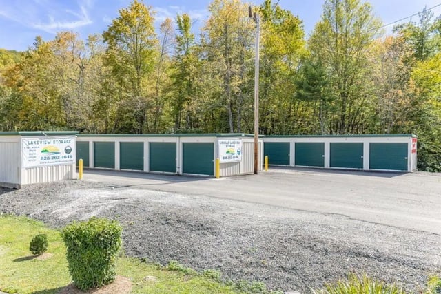 Storage units with green doors exterior at Boone High Country Rentals in Boone Student Accommodation
