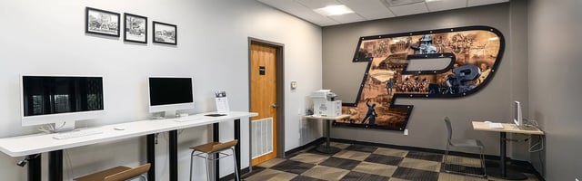 Computers printer wall art with chairs Study Area at Station 21 in West Lafayette Student Accommodation