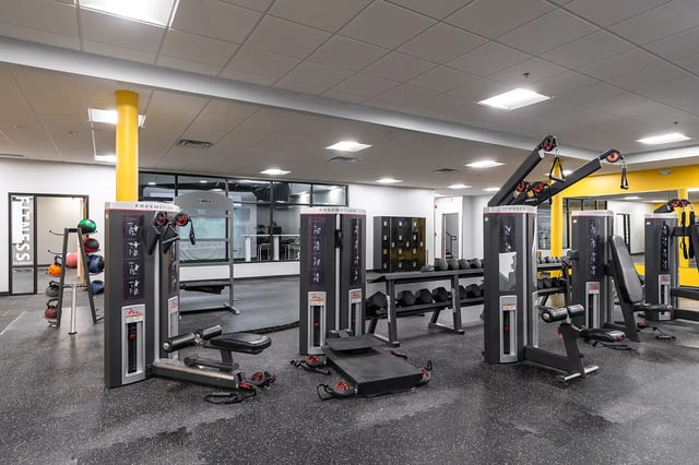 Gym equipment weight rack lockers fitness area at Station 21 in West Lafayette Student Accommodation
