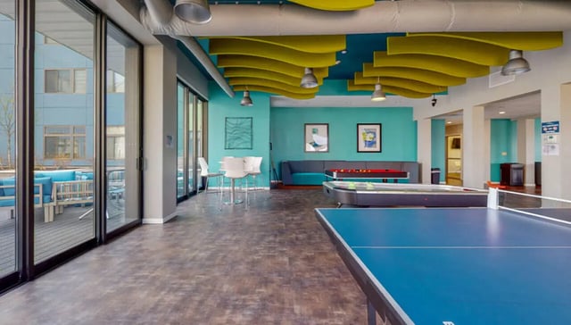 Ping pong table billiard table and lounge area at Auden Albany in Albany Student Accommodation