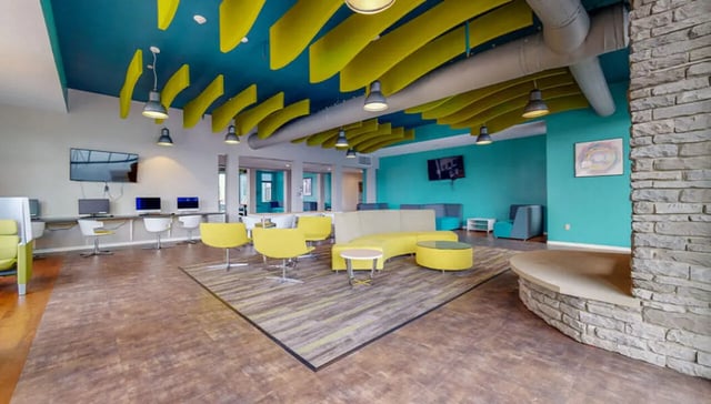 Computer stations and lounge seating common area at Auden Albany in Albany Student Accommodation