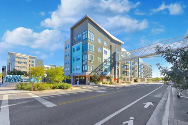 Modern apartment building with sky bridge exterior at Park Place Tempe in Tempe Student Accommodation