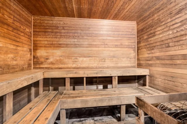 Wooden benches and walls form sauna room at Arbor Glen Apartments in East Lansing Student Accommodation