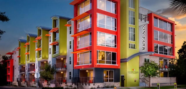 Modern colorful apartment building exterior exterior at Heritage Oaks Luxury Apartments in Gainesville Student Accommodation