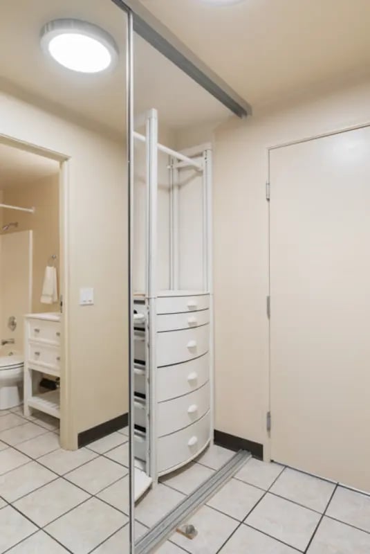 Closet with drawers and clothing rod bathroom visible closet area at Dixie Cove Student Housing in St. George Student Accommodation