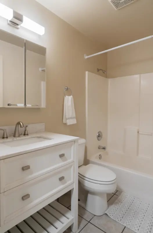 Bathroom with vanity toilet and bathtub. at Dixie Cove Student Housing in St. George Student Accommodation