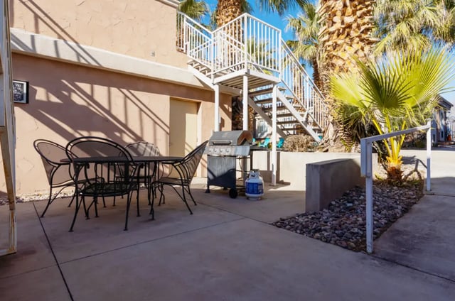 Outdoor seating area with grill patio exterior at Dixie Cove Student Housing in St. George Student Accommodation