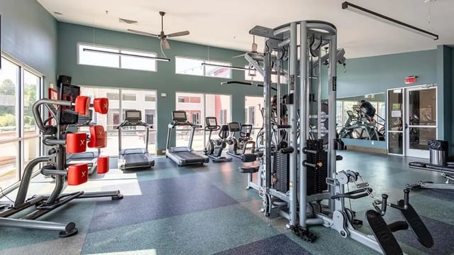 Gym equipment with treadmills and weight machines gym at Hawks Landing Apartments in Cape Girardeau Student Accommodation