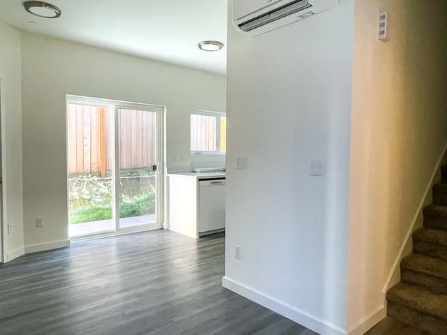 Air conditioner sliding glass door kitchen living room at Husky Urban Living in Seattle Student Accommodation