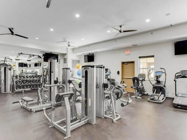 Gym equipment and treadmills fitness area at University Commons