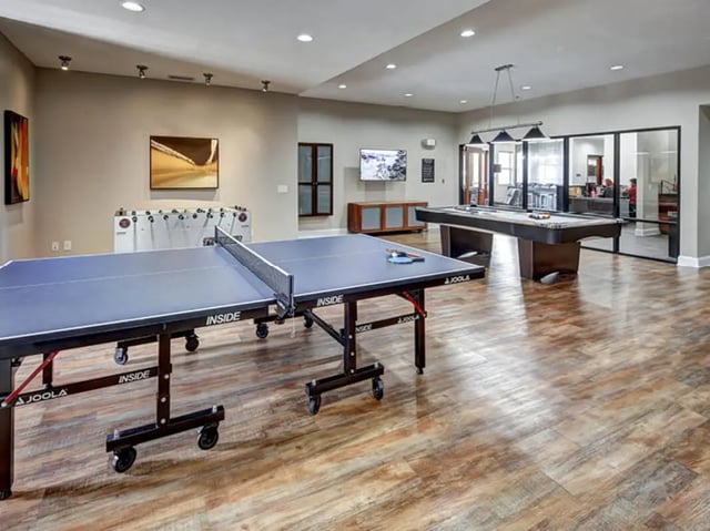 Ping pong table foosball and pool room at University Commons