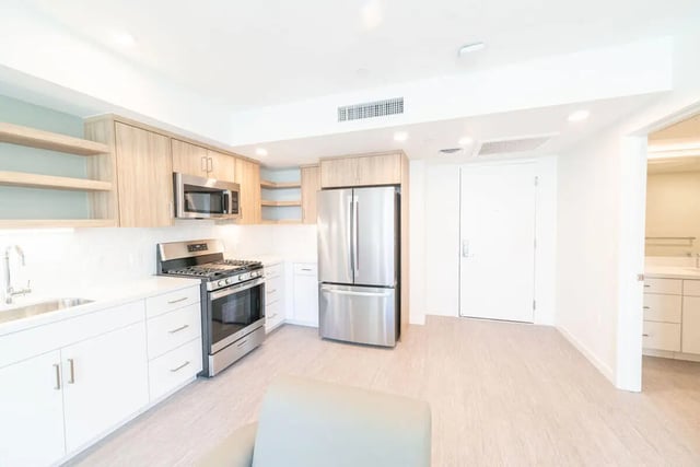 Kitchen with stainless steel appliances and cabinets kitchen at The Kittredge in Berkeley Student Accommodation