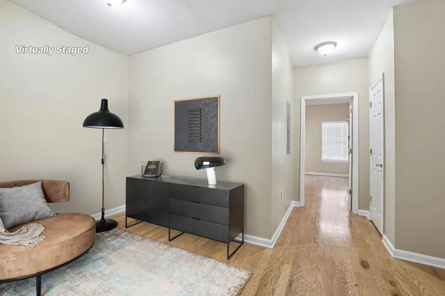 Couch lamp cabinet rug and doorway hallway at Stadium Properties Apartments in Tallahassee Student Accommodation