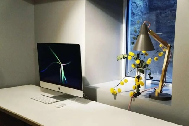 Apple computer keyboard mouse decorative lamp study area at The Legacy at Drexel Arms Apartments in Philadelphia Student Accommodation