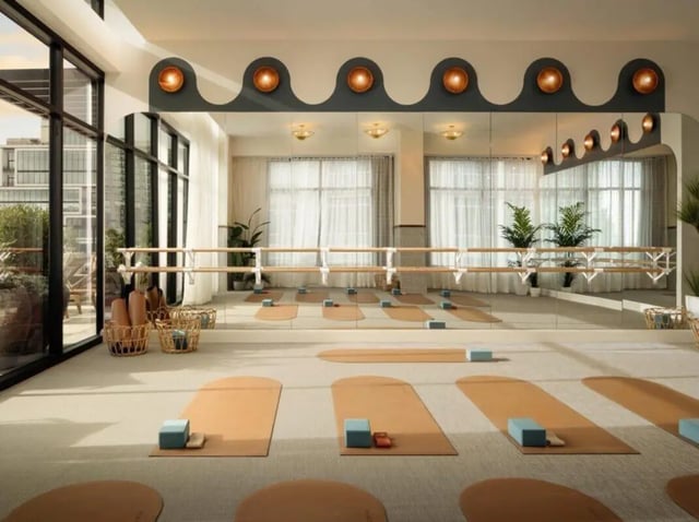 Yoga studio with mats blocks and ballet barre playing area at Rambler Atlanta Apartments in Atlanta Student Accommodation
