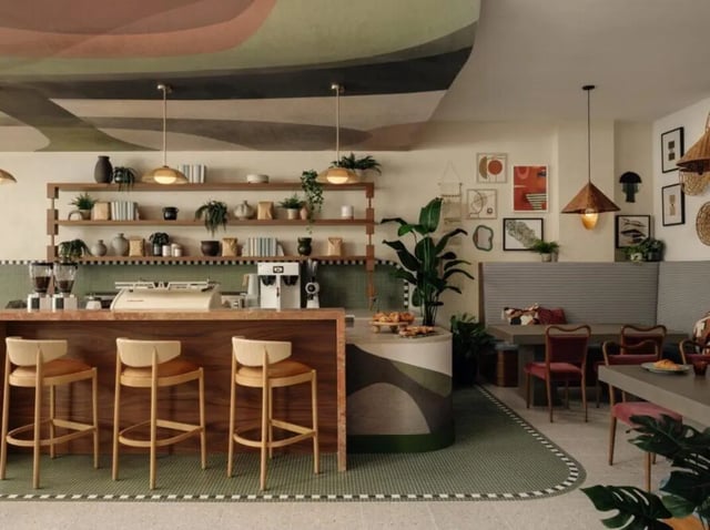 Bar with stools and seating area at Rambler Atlanta Apartments in Atlanta Student Accommodation