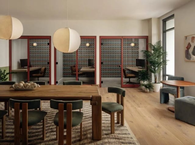 Private study booths and communal dining table study area at Rambler Atlanta Apartments in Atlanta Student Accommodation
