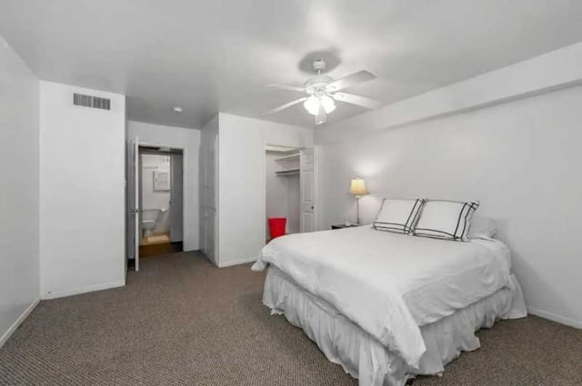 Bed ceiling fan closet and bathroom bedroom at University Terrace Apartments in State College Student Accommodation