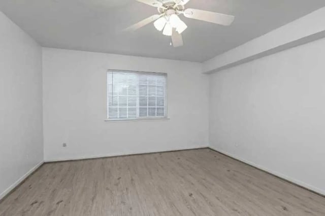 White empty room with blinds and fan bedroom at University Terrace Apartments in State College Student Accommodation
