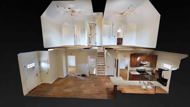 Staircase and kitchen with wood cabinets Image Type at Forrest Edge Townhomes in Boone Student Accommodation