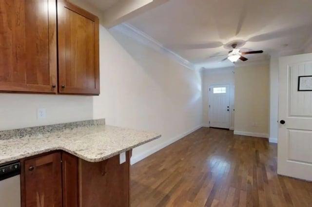 Wood cabinets granite counter and entrance living room at Forrest Edge Townhomes in Boone Student Accommodation