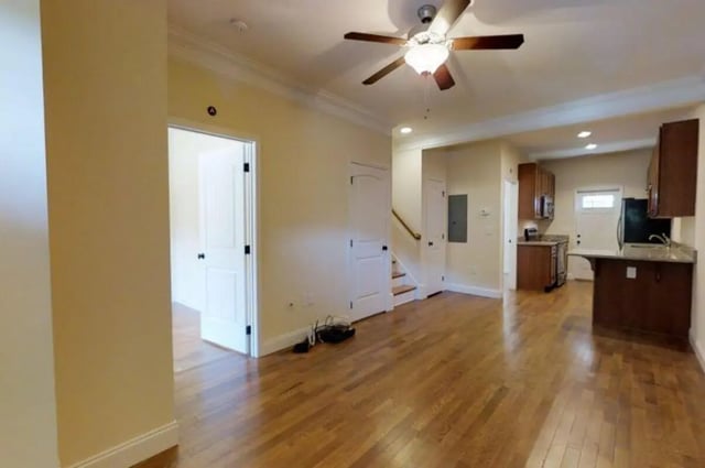 Open doors staircase and kitchen living area at Forrest Edge Townhomes in Boone Student Accommodation
