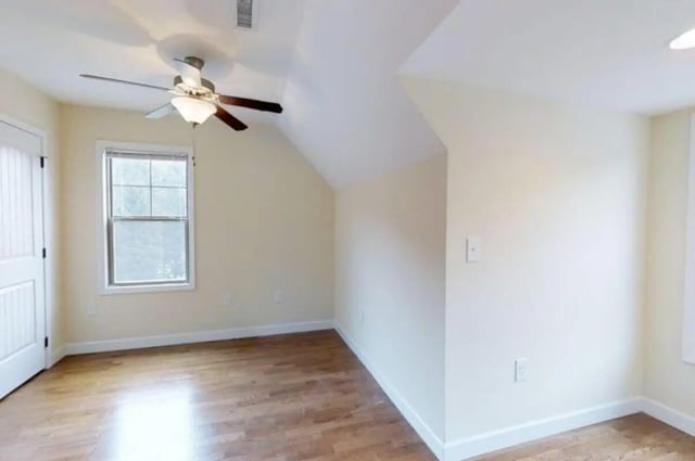Ceiling fan door window wooden floor bedroom at Forrest Edge Townhomes in Boone Student Accommodation