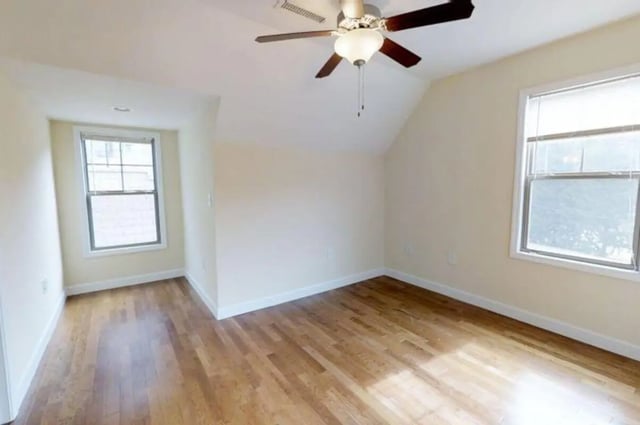 Empty room wood floors ceiling fan windows bedroom at Forrest Edge Townhomes in Boone Student Accommodation