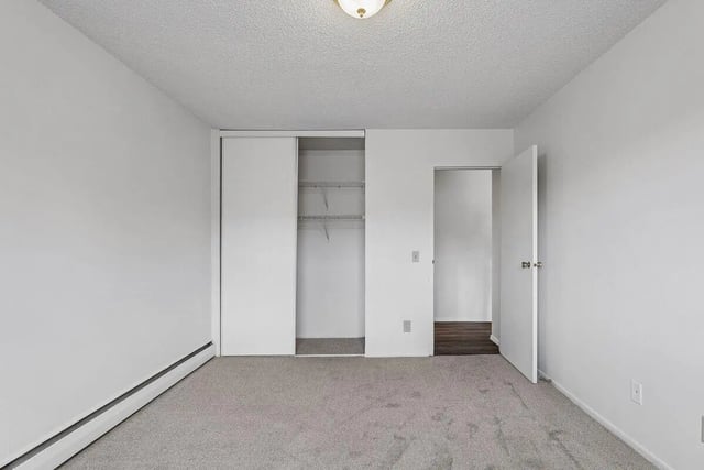 White closet open door with shelves bedroom at Marcy Park Student Housing Co-op in Minneapolis Student Accommodation