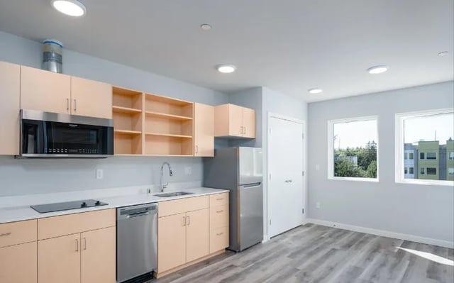 Kitchen with microwave dishwasher refrigerator kitchen kitchen at Thirty One Apartments in Seattle Student Accommodation