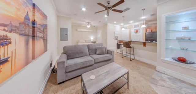 Sofa coffee table bar stools kitchen living room at Greystone Luxury Apartments in Gainesville Student Accommodation