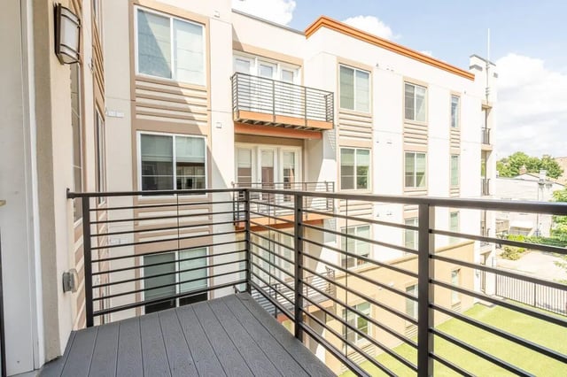 Balcony with wooden floor and railing exterior at The Eden Apartments in Cincinnati Student Accommodation