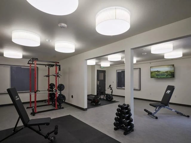 Weight rack bench press cardio machines gym at Abigail Court in Gresham Student Accommodation