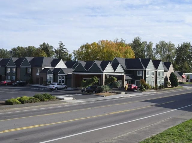 Apartment buildings cars and trees exterior at Abigail Court in Gresham Student Accommodation