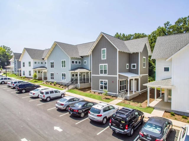 Apartment buildings with parked cars exterior at Boulevard in Milledgeville Student Accommodation