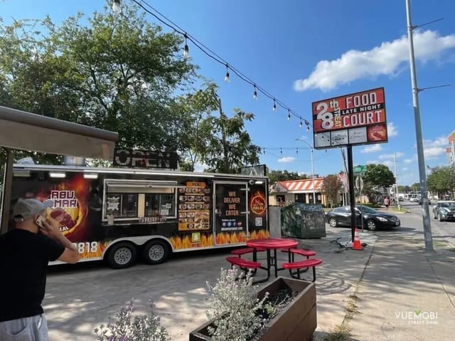 Food truck picnic table exterior dining area at Barranca Square Student Apartments in Austin Student Accommodation