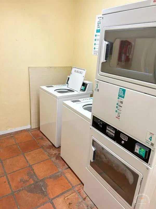 Washing machines and dryers Laundry room at Barranca Square Student Apartments in Austin Student Accommodation
