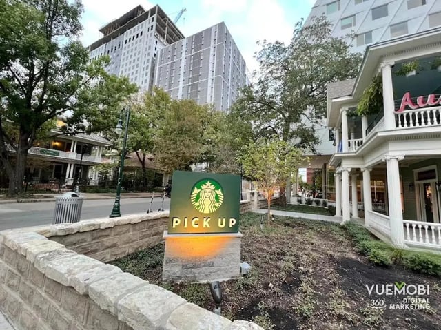 Starbucks pick up sign near buildings exterior at Barranca Square Student Apartments in Austin Student Accommodation