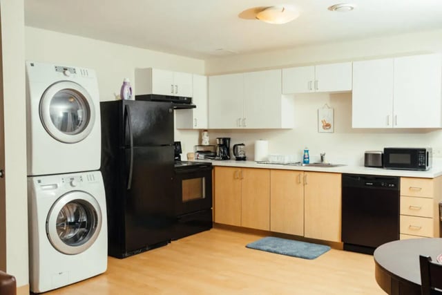 Washer dryer refrigerator oven dishwasher kitchen at Copper Beech Commons Student Housing in Syracuse Student Accommodation