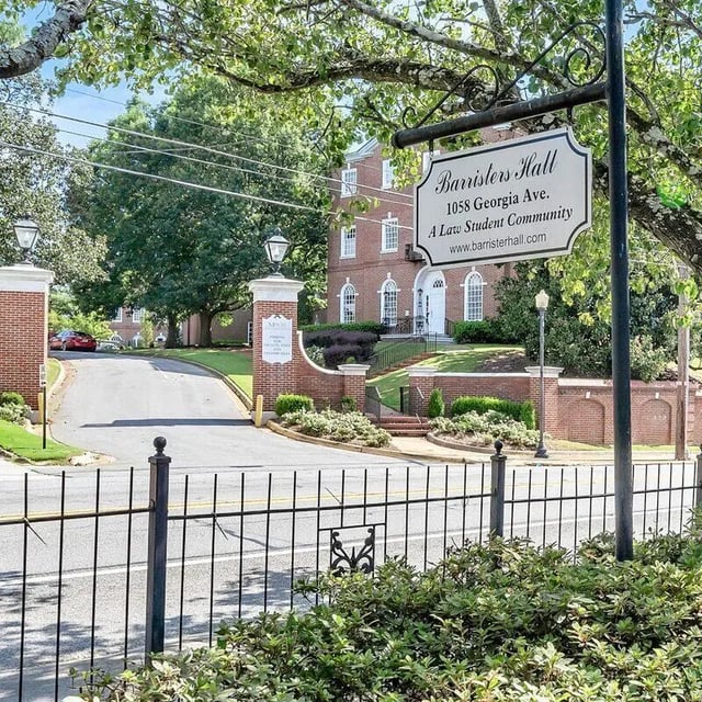 Barristors Hall sign brick building fence exterior at Barristers Hall in Macon Student Accommodation