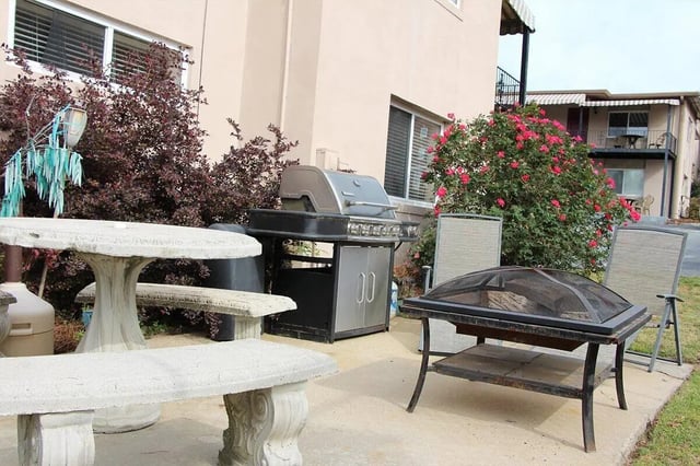 Concrete table grill fire pit chairs exterior at Barristers Hall in Macon Student Accommodation