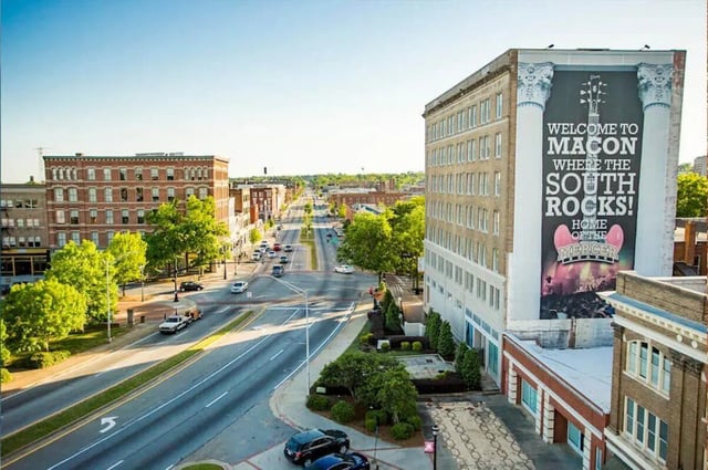 City street with buildings and cars exterior at Barristers Hall in Macon Student Accommodation